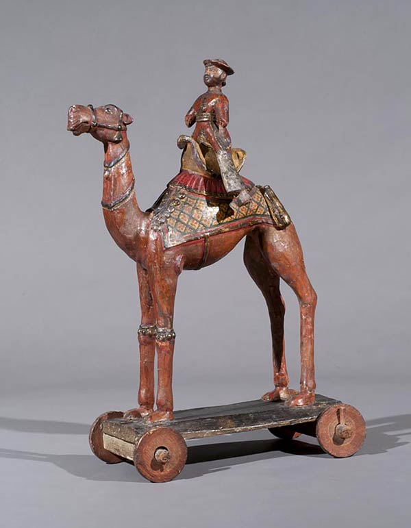 Northern India, A Camel with Rider, Circa 1800, 45 cms, A wooden base, applied with composition, covered with cloth & paint